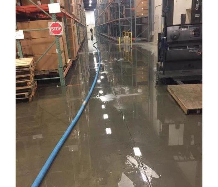 flooding down aisles of Jacksonville warehouse