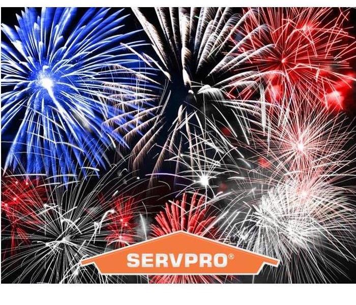 Fireworks display with SERVPRO logo.